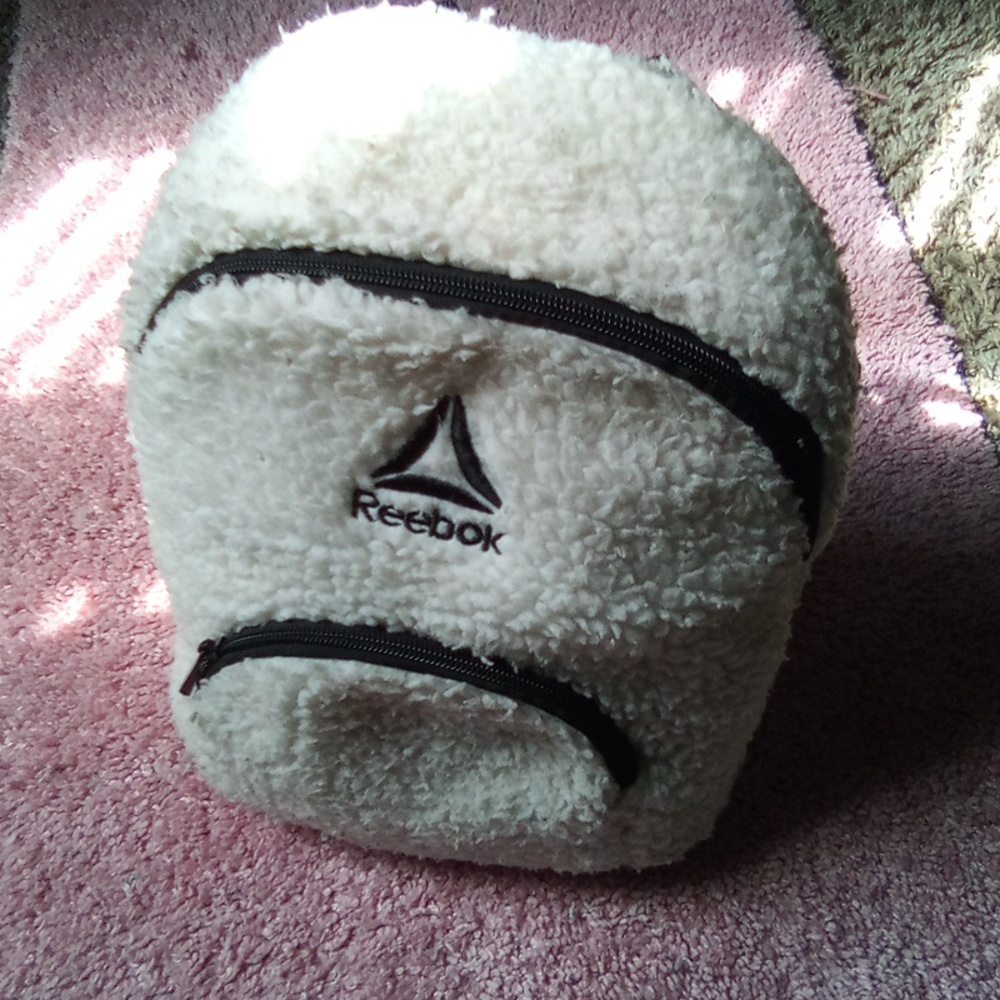 Terrycloth backpack by Reebok w front and inside pockets.